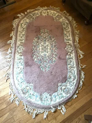 Set of three wool rugs, one is a rectangle