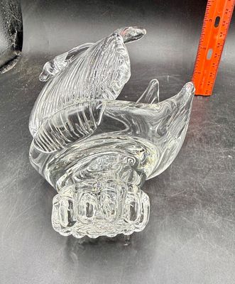 Sale Photo Thumbnail #523: Vintage clear crystal swan trinket dish featuring textured, feather-like wings and an elegant arched neck. Good condition, approx. 6" tall.