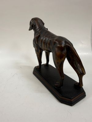 Sale Photo Thumbnail #54: 19th-century style bronze sculpture of a hunting dog mounted on a dark rectangular base