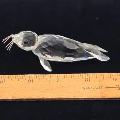LOT 137: Vintage Retired Swarovski Crystal Blowfish, Seal, Miniature Drake, and Starfish Figurines