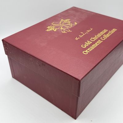 LOT 99: Danbury Mint Gold Christmas Ornament Collection - 12 Ornaments