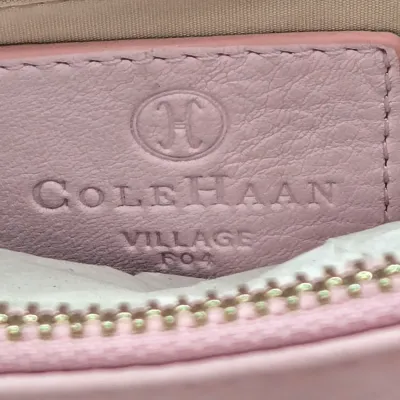 LOT 142: Pink Pebbled Leather Handbag from the Cole Haan Village Collection