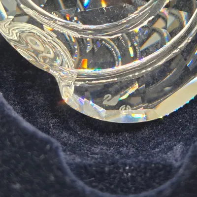 LOT 122: SWAROVSKI Crystal Snail Shell Wonder of The Sea, Scalloped Shell, Swan, and Frog Prince Figurines/ All in Original Boxes