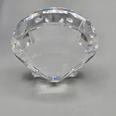 LOT 122: SWAROVSKI Crystal Snail Shell Wonder of The Sea, Scalloped Shell, Swan, and Frog Prince Figurines/ All in Original Boxes