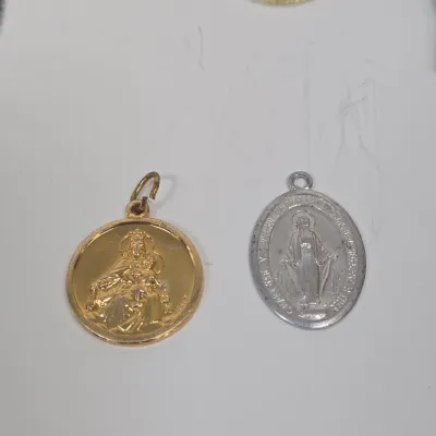 LOT 52: Statue Depicting the Infant Jesus of Prague, Multiple Scapulars, Italian-made Crucifix Pendant, and More