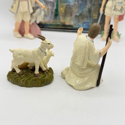 LOT 100: Bradford Exchange Collectibles - Nativity Figurines and World Trade Center Collectible Plate