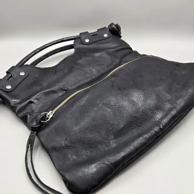 LOT 157: Black Leather Foldover Handbag by Pietro Alessandro