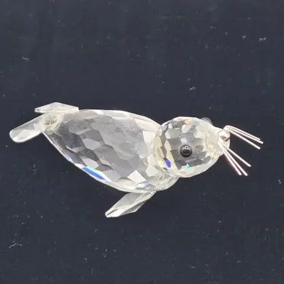 LOT 137: Vintage Retired Swarovski Crystal Blowfish, Seal, Miniature Drake, and Starfish Figurines