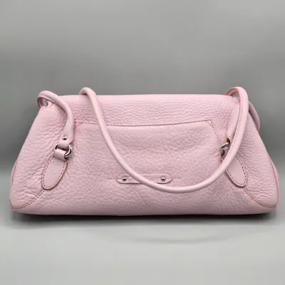 LOT 142: Pink Pebbled Leather Handbag from the Cole Haan Village Collection