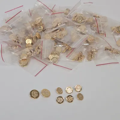 LOT 44: Multiple Sets of Vintage Gold-tone Crest Buttons and More
