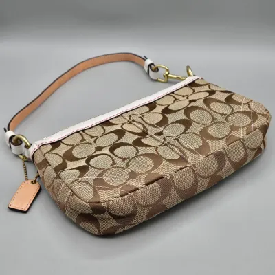 LOT 143: Coach Signature Poppy Floral Demi Clutch