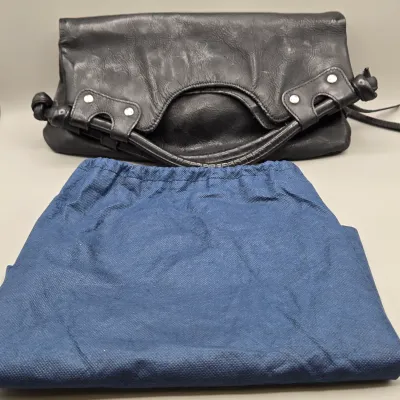 LOT 157: Black Leather Foldover Handbag by Pietro Alessandro
