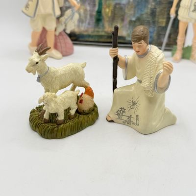 LOT 100: Bradford Exchange Collectibles - Nativity Figurines and World Trade Center Collectible Plate