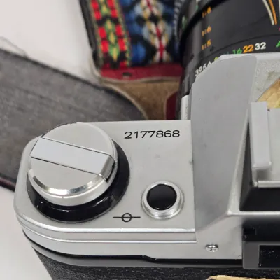 LOT 42: Vintage Canon AE-1 35mm SLR Film Camera with Telephoto Zoom Lense and Strap