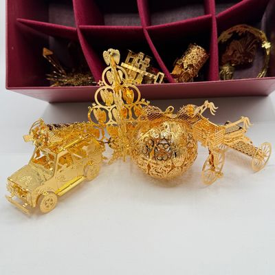LOT 99: Danbury Mint Gold Christmas Ornament Collection - 12 Ornaments