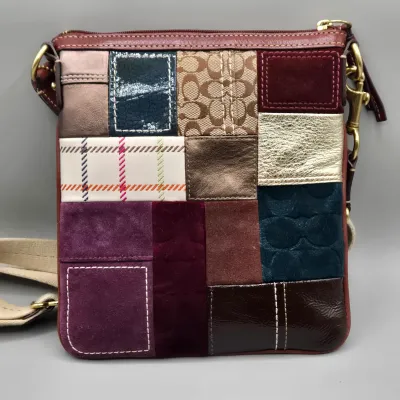 LOT 140: Coach Holiday Patchwork Swing Pack Shoulder Bag