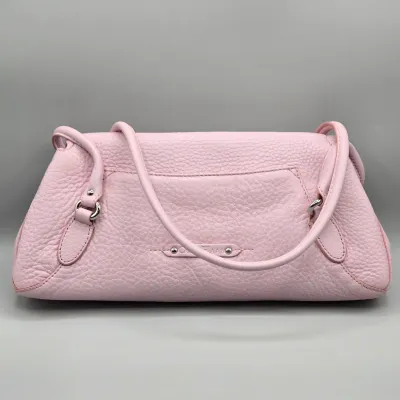 LOT 142: Pink Pebbled Leather Handbag from the Cole Haan Village Collection