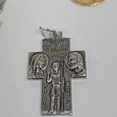 LOT 52: Statue Depicting the Infant Jesus of Prague, Multiple Scapulars, Italian-made Crucifix Pendant, and More