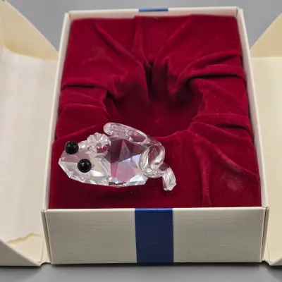 LOT 122: SWAROVSKI Crystal Snail Shell Wonder of The Sea, Scalloped Shell, Swan, and Frog Prince Figurines/ All in Original Boxes