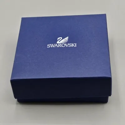 LOT 122: SWAROVSKI Crystal Snail Shell Wonder of The Sea, Scalloped Shell, Swan, and Frog Prince Figurines/ All in Original Boxes