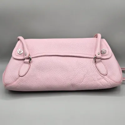 LOT 142: Pink Pebbled Leather Handbag from the Cole Haan Village Collection