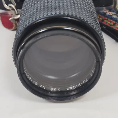 LOT 42: Vintage Canon AE-1 35mm SLR Film Camera with Telephoto Zoom Lense and Strap