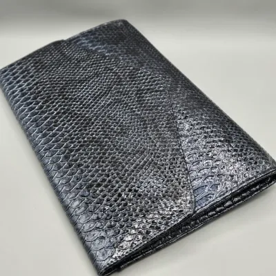 LOT 144: Black and Silver Faux Snakeskin Envelope Clutch Purse by Giannini
