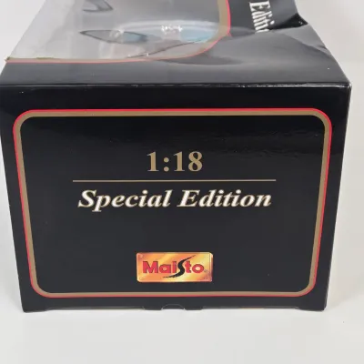 LOT 54: Maisto 1:18 Scale 1955 Mercedes-Benz 300S Die-Cast Special Edition Model and Vintage Bachmann Mini-Planes #16 Spirit of St. Louis