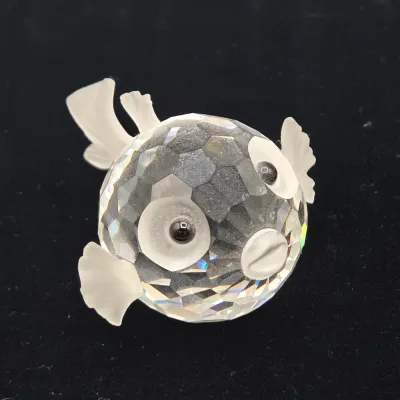 LOT 137: Vintage Retired Swarovski Crystal Blowfish, Seal, Miniature Drake, and Starfish Figurines