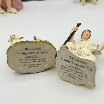 LOT 100: Bradford Exchange Collectibles - Nativity Figurines and World Trade Center Collectible Plate