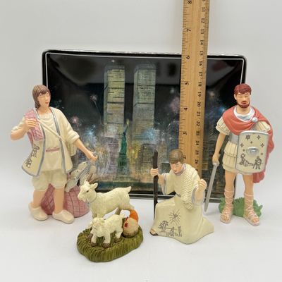 LOT 100: Bradford Exchange Collectibles - Nativity Figurines and World Trade Center Collectible Plate