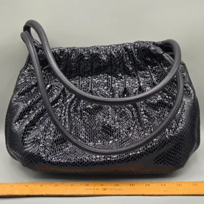 LOT 147: Black Python-embossed Leather Hobo Bag by Brighton