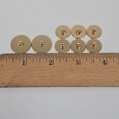 LOT 44: Multiple Sets of Vintage Gold-tone Crest Buttons and More