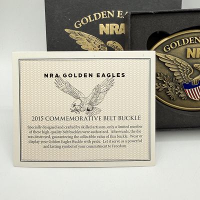 LOT 81: Two NRA Golden Eagles Commemorative Belt Buckles