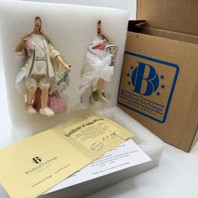 LOT 100: Bradford Exchange Collectibles - Nativity Figurines and World Trade Center Collectible Plate