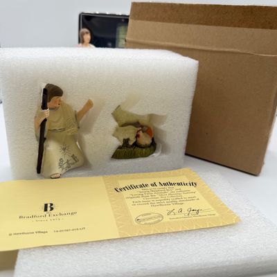 LOT 100: Bradford Exchange Collectibles - Nativity Figurines and World Trade Center Collectible Plate