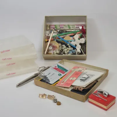 LOT 54: Swank Tie Pin with Matching Cufflinks, Vintage Caravelle Wristwatch, Socony Gas 5 Year Pin, Gold-tone WWII Honorable Discharge...
