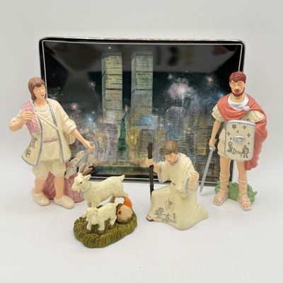 LOT 100: Bradford Exchange Collectibles - Nativity Figurines and World Trade Center Collectible Plate