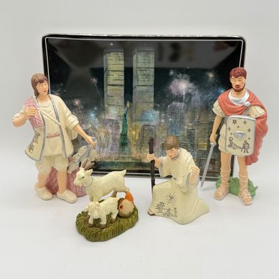 LOT 100: Bradford Exchange Collectibles - Nativity Figurines and World Trade Center Collectible Plate