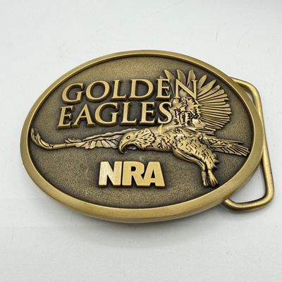 LOT 81: Two NRA Golden Eagles Commemorative Belt Buckles