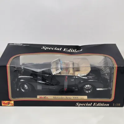 LOT 54: Maisto 1:18 Scale 1955 Mercedes-Benz 300S Die-Cast Special Edition Model and Vintage Bachmann Mini-Planes #16 Spirit of St. Louis