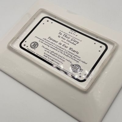 LOT 100: Bradford Exchange Collectibles - Nativity Figurines and World Trade Center Collectible Plate