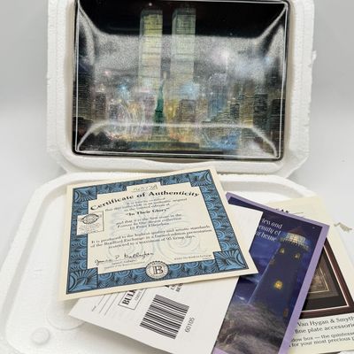 LOT 100: Bradford Exchange Collectibles - Nativity Figurines and World Trade Center Collectible Plate
