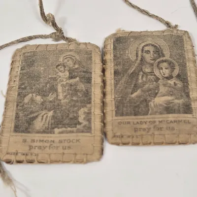 LOT 52: Statue Depicting the Infant Jesus of Prague, Multiple Scapulars, Italian-made Crucifix Pendant, and More
