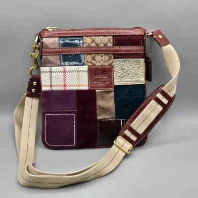LOT 140: Coach Holiday Patchwork Swing Pack Shoulder Bag