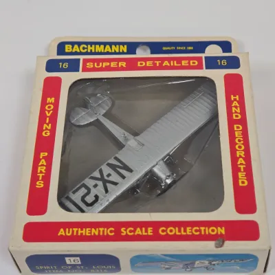 LOT 54: Maisto 1:18 Scale 1955 Mercedes-Benz 300S Die-Cast Special Edition Model and Vintage Bachmann Mini-Planes #16 Spirit of St. Louis