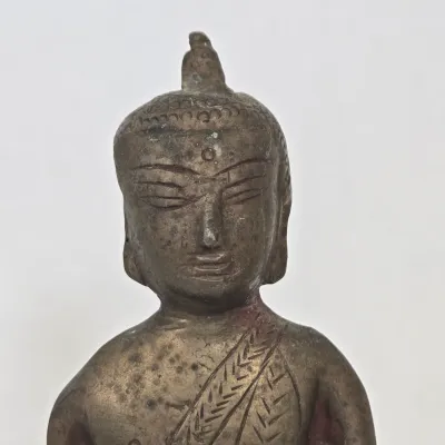 LOT 47: Southeast Asian Standing Metal Buddha Statue and Pair of Candlestick Holders