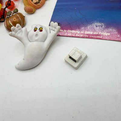 LOT 87: Collection of Holiday Pins, Earrings and More