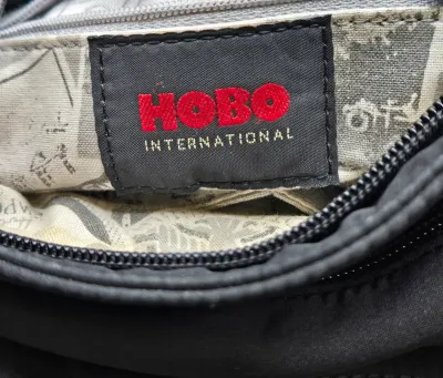 LOT 145: Black Nylon Crossbody Shoulder Bag with an Adjustable Strap by Hobo International