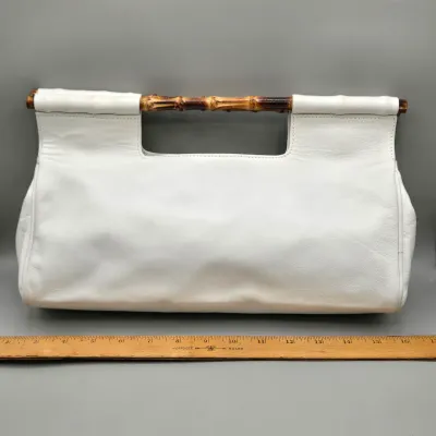 LOT 156: White Leather Handbag with a Bamboo Top Handle by Tanner Made in Italy
